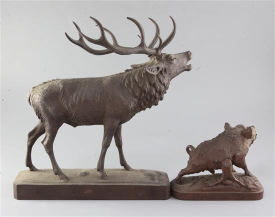 A Black Forest carved wood model of a ten point stag, height 6in.